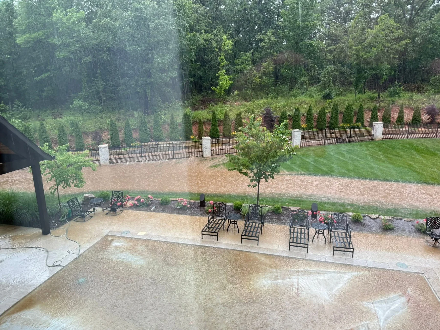 Pool property during heavy rain after drainage improvements