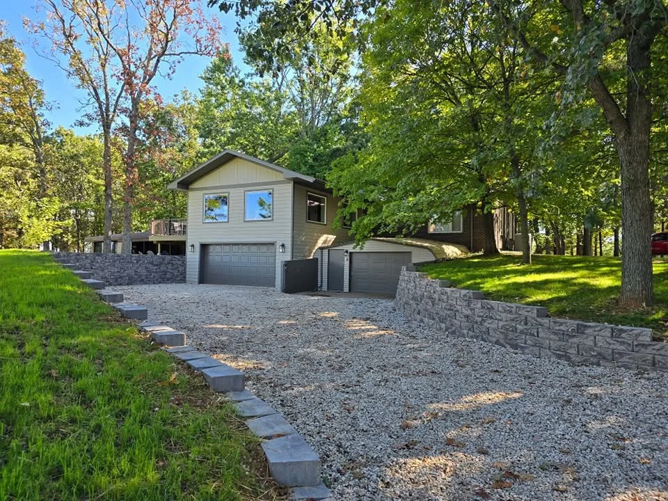 Finished driveway retaining wall system